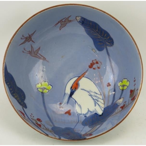 121 - A Japanese Arita bowl, late Meiji/Taisho period. Unusually decorated with birds in a naturalistic se... 