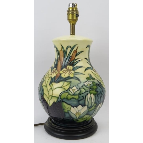 139 - A Moorcroft Lamia pattern table lamp. Of bulbous form with tubeline decoration. 13.8 in (35 cm) heig... 