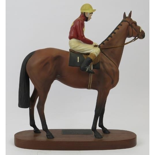 147 - A large Beswick connoisseur model of Red Rum. Modelled on a wooden base inscribed ’Red Rum Brian Fle... 