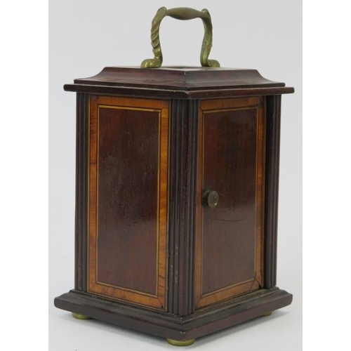 21 - An Edwardian mahogany carriage clock. With a bevelled glass front and enamelled Roman numeral dial. ... 