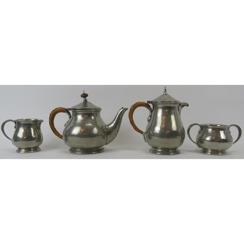 244 - Liberty and Co, English pewter 4 piece tea set, 1372. Hammered surface. Raffia handle to tea pot. Wa... 