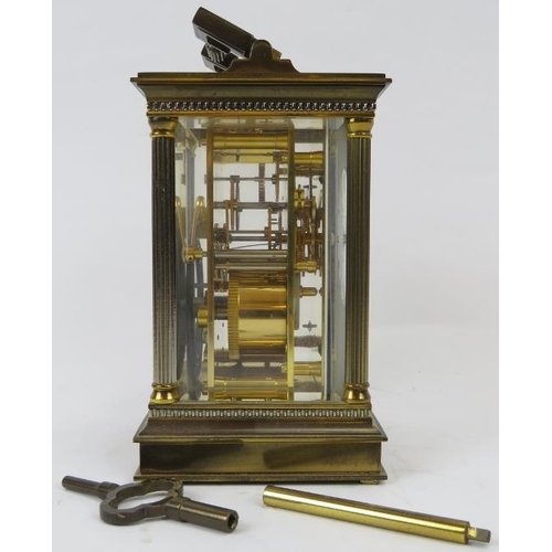 25 - A good quality Matthew Norman of London brass striking carriage clock. Engine turned face with ename... 