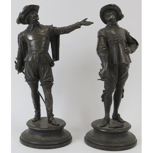 253 - After E. Guillemin (1841-1907) pair of silver plated bronze standing musketeers. Impressed name to c... 