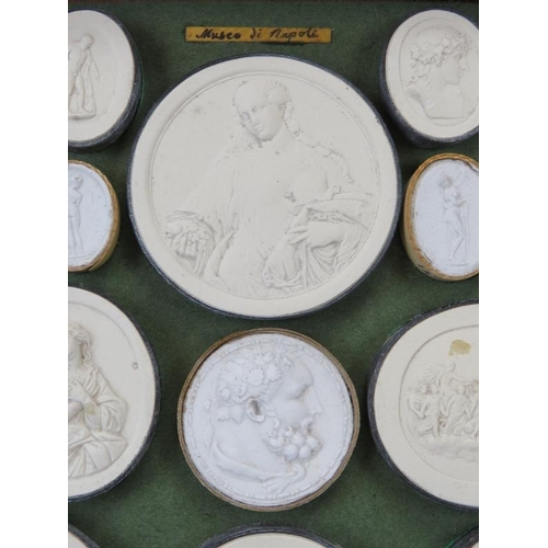 259 - A large collection of Italian Grand Tour Plaster Intaglios. Displayed in two trays, each tray with h... 