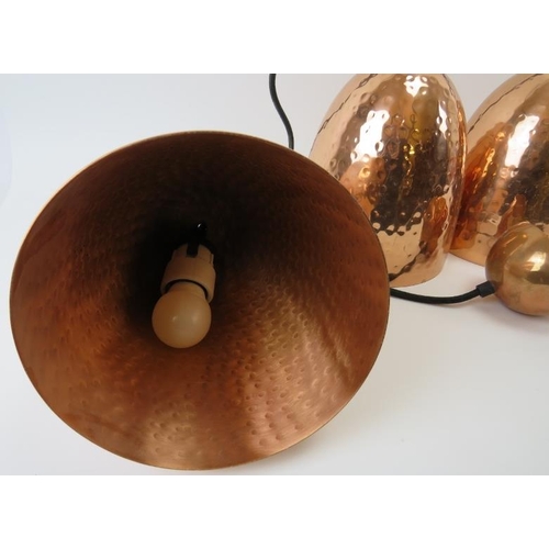 262 - Five copper lamp shades. Dome beaten design with matching fittings. Each 8