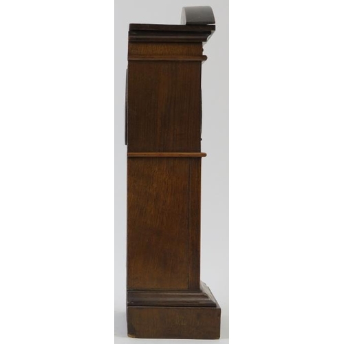 266 - Miniature long case clock, walnut, traces of gilding to etched panel, not tested, 18cm height. 
Cond... 