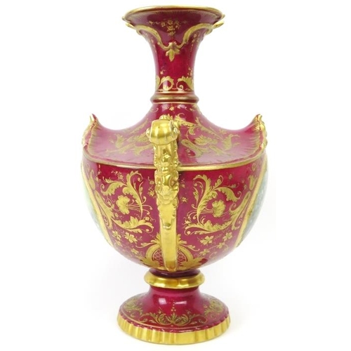 3 - A European twin handled floral and gilt decorated vase, 19th century. Probably German manufactured. ... 