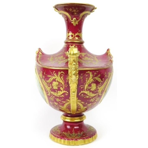 3 - A European twin handled floral and gilt decorated vase, 19th century. Probably German manufactured. ... 