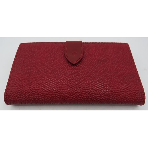 314 - A Mulberry maroon wallet and combined purse with original Mulberry plaid.
Condition report: Good con... 