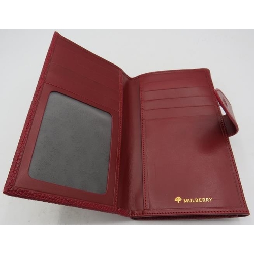 314 - A Mulberry maroon wallet and combined purse with original Mulberry plaid.
Condition report: Good con... 