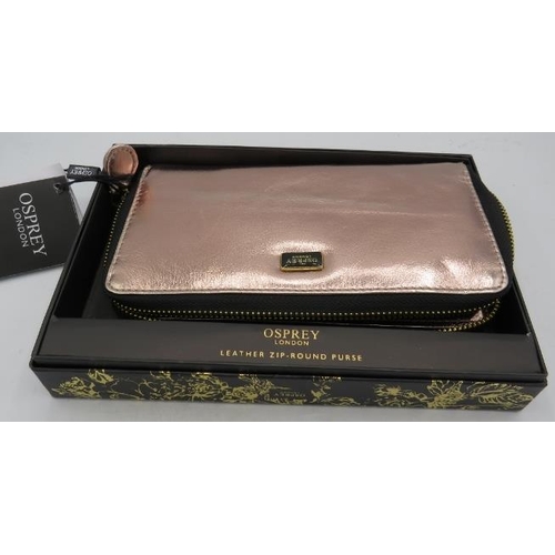 316 - A rose gold Osprey leather zip round purse, boxed.
Condition report: As new.