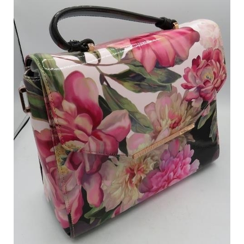 320 - A Ted Baker multi-floral handbag.
Condition report: Good condition.