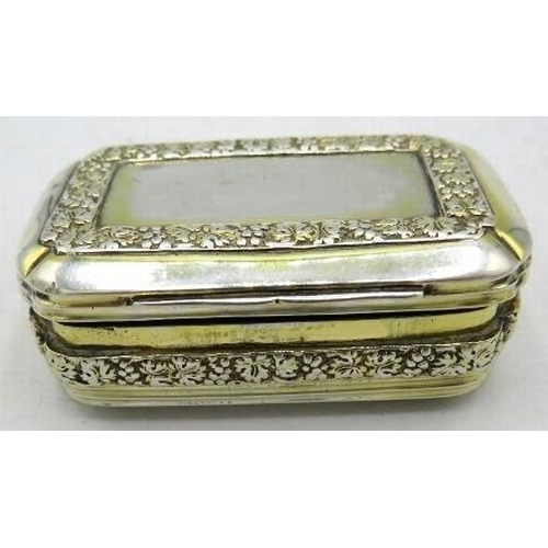 334 - A Georgian silver gilt snuff box with piano hinge and floral decoration, London 1814, makers mark wo... 