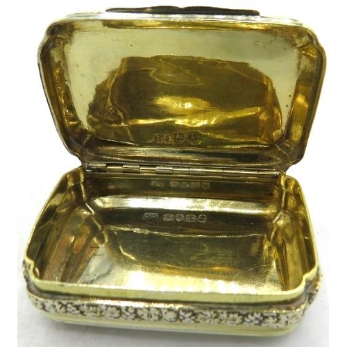 334 - A Georgian silver gilt snuff box with piano hinge and floral decoration, London 1814, makers mark wo... 