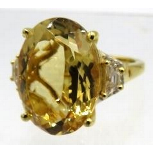 343 - Large Citrine statement ring.  Oval faceted 18mm x 13mm solitaire of good colour saturation, cut & c... 