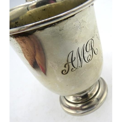 363 - A silver Christening mug on a pedestal foot, monogrammed, Birmingham 1927, approx 3 1/2