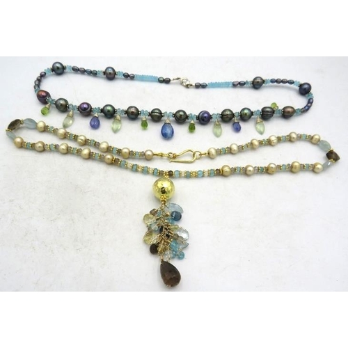 381 - A gold vermeil necklace with blue pearls, centre sapphire, aquamarine & apatite and a gold vermeil n... 