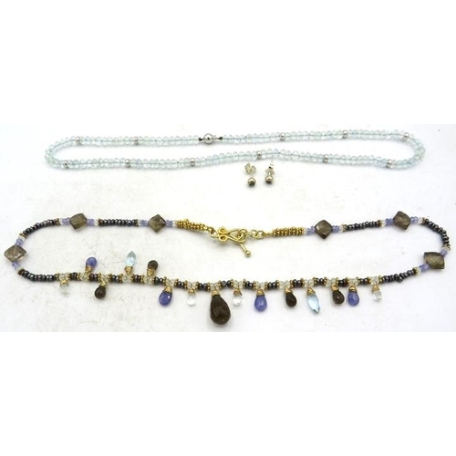 385 - A delicate vermeil fringe necklace set with various semi-precious stones & pearls, including tanzani... 