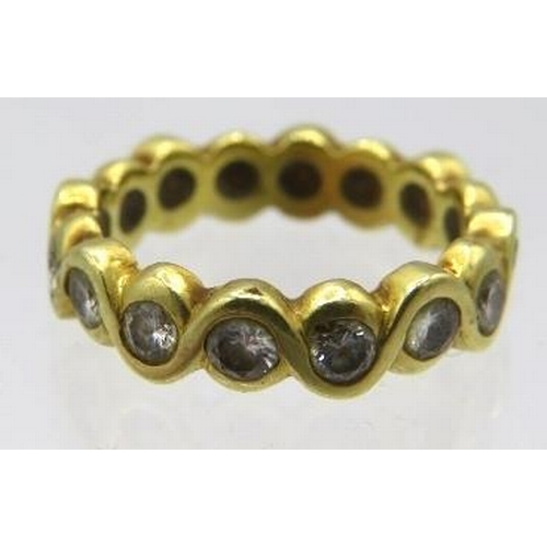 390 - An 18ct yellow gold eternity ring set with 16 diamonds, approx 1ct, size H. Approx weight 4.4 grams.... 