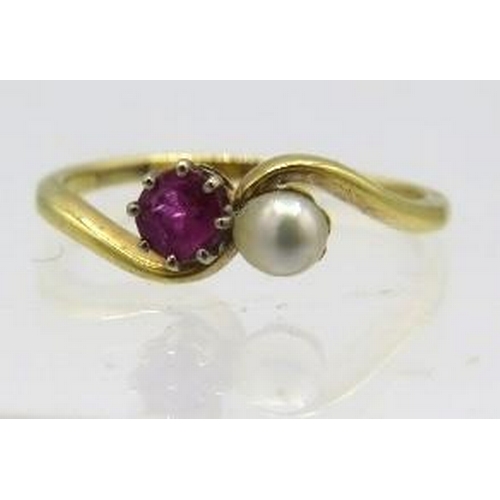 391 - A 9ct yellow gold cross over ruby & pearl ring, size L. Approx weight 2.3 grams.
Condition report: S... 