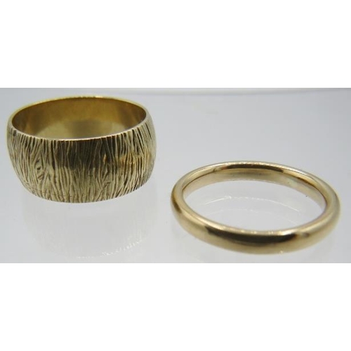 404 - Two 9ct yellow gold wedding rings, one marked W.WLd and dated London 1932, size O and Q/R, boxed. Ap... 