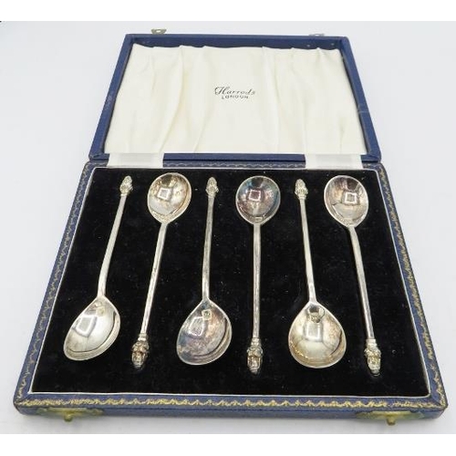 425 - A set of six silver coffee spoons with Arab head finials, London 1961, Harrods, London box. Approx w... 