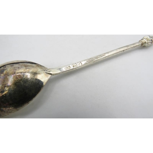 425 - A set of six silver coffee spoons with Arab head finials, London 1961, Harrods, London box. Approx w... 