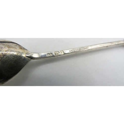 425 - A set of six silver coffee spoons with Arab head finials, London 1961, Harrods, London box. Approx w... 