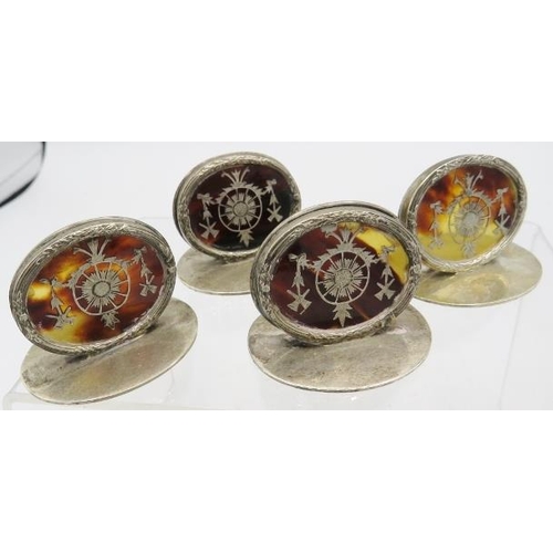 426 - A set of four silver & tortoiseshell pique menu holders, Birmingham 1910, William Comyns. Approx wei... 