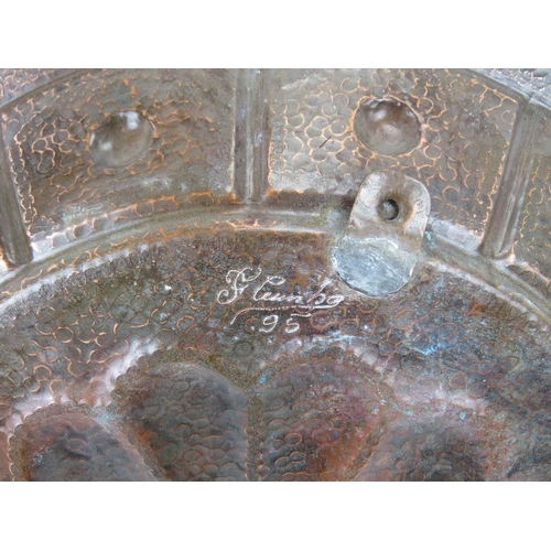 45 - A large Portuguese planished copper charger by F Cunha. Signed and dated 95 to the reverse. The craf... 