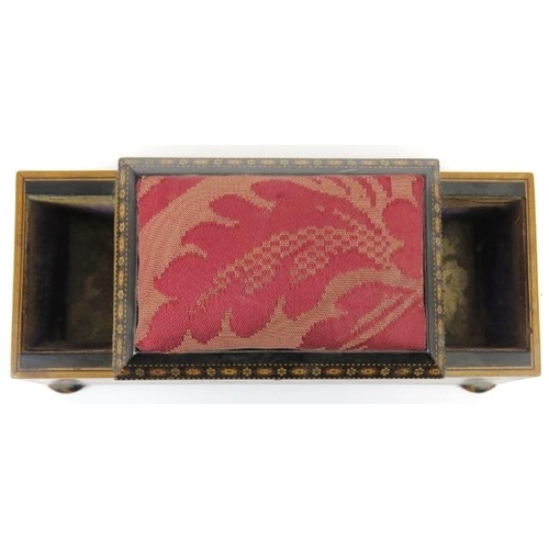 49 - An unusual Victorian Tunbridge ware sewing box, 19th century. Incorporated with a central hinged cov... 