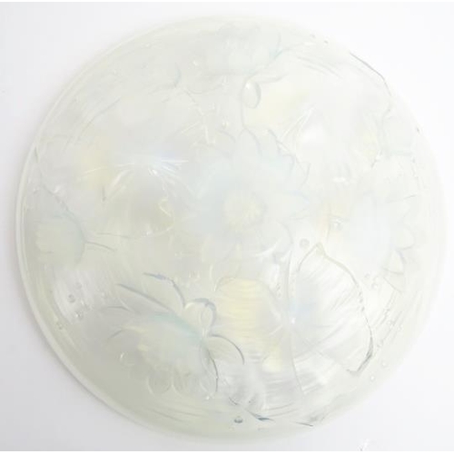 52 - A French Verlys opalescent glass bowl. Decorated with flowering water lilies. 13.9 in (35.3 cm) diam... 