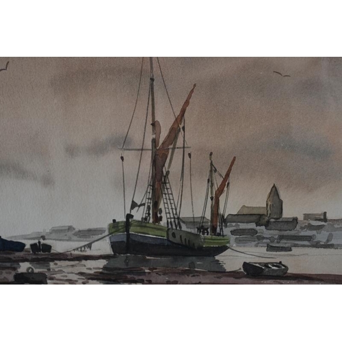 566 - Alan Whitehead (British, b. 1952) - 'Harbour scene, tide out, moored boats', watercolour, signed, De... 