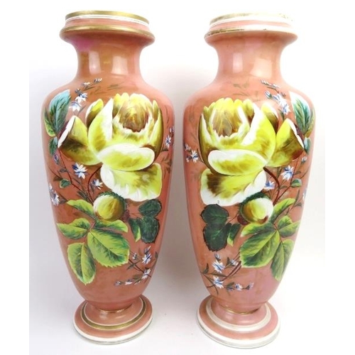 58 - A large pair of Victorian pink opaline glass vases. Both of baluster form, the exteriors enamel pain... 