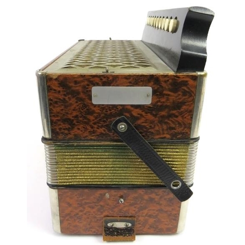 67 - A Hohner melodeon, circa 1940s. Modelled with a simulated burr walnut exterior. 7.3 in (18.5 cm) app... 