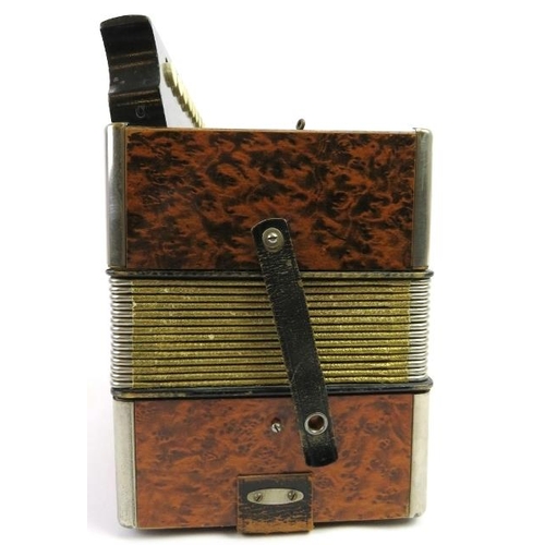 67 - A Hohner melodeon, circa 1940s. Modelled with a simulated burr walnut exterior. 7.3 in (18.5 cm) app... 