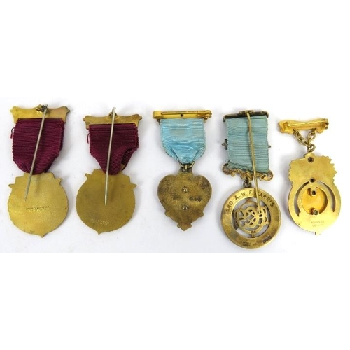 72 - A collection of Masonic items. Including two enamelled silver gilt medals, a silver medal of oval fo... 