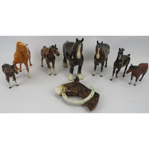 87 - A collection of Beswick horse figurines. (8 items) Shire horse: 8.5 in (21.5 cm) height. 
Condition ... 