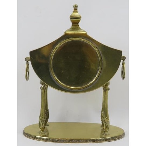 90 - A brass twin handled mantle clock, early 20th century. With Neoclassical elements. Key and pendulum ... 