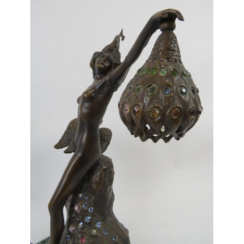 95 - A bronze Art Nouveau style peacock themed figural table lamp, 20th century. Modelled after the Belgi... 