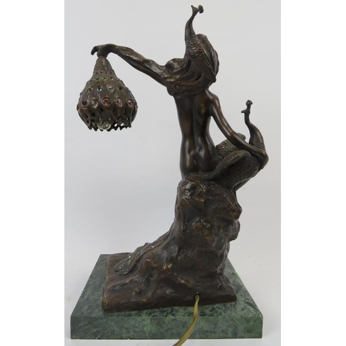 95 - A bronze Art Nouveau style peacock themed figural table lamp, 20th century. Modelled after the Belgi... 