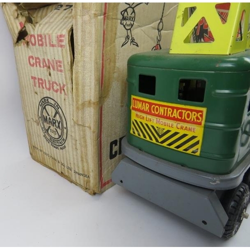 98 - A large Marx Toys tinplate and pressed steel model of a mobile crane truck. Model number 2734. Paint... 