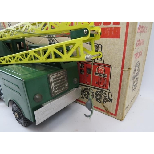 98 - A large Marx Toys tinplate and pressed steel model of a mobile crane truck. Model number 2734. Paint... 