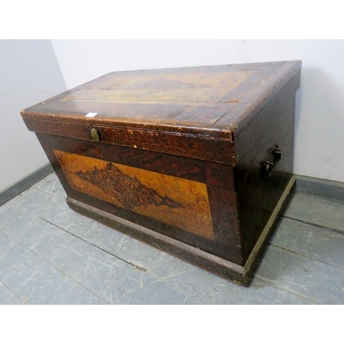 705 - An antique pine flat top trunk, painted in the Continental style, the internal candle box with two s... 