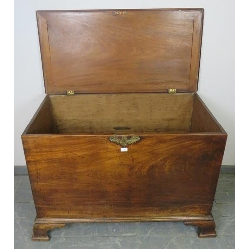 708 - A large Georgian mahogany blanket trunk of excellent colour, with fancy brass escutcheon and brass h... 