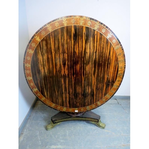 712 - A fine Regency Period coromandel tilt-top breakfast table in the manner of George Bullock, the cross... 