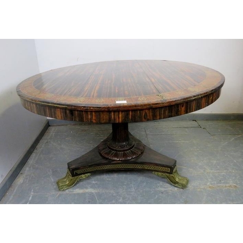 712 - A fine Regency Period coromandel tilt-top breakfast table in the manner of George Bullock, the cross... 