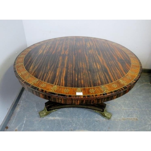 712 - A fine Regency Period coromandel tilt-top breakfast table in the manner of George Bullock, the cross... 