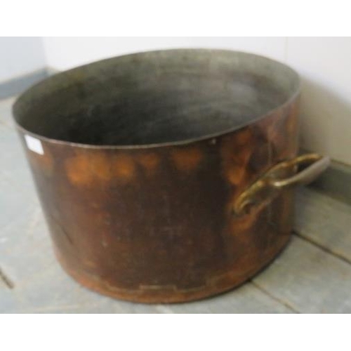 717 - A large 19th century copper jam pan, with handles to either side. Would serve as an ideal log bin.
H... 