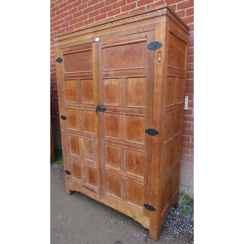 720 - An early Mouseman burr oak panelled double wardrobe from the Kilburn workshops of Robert Thompson, c... 